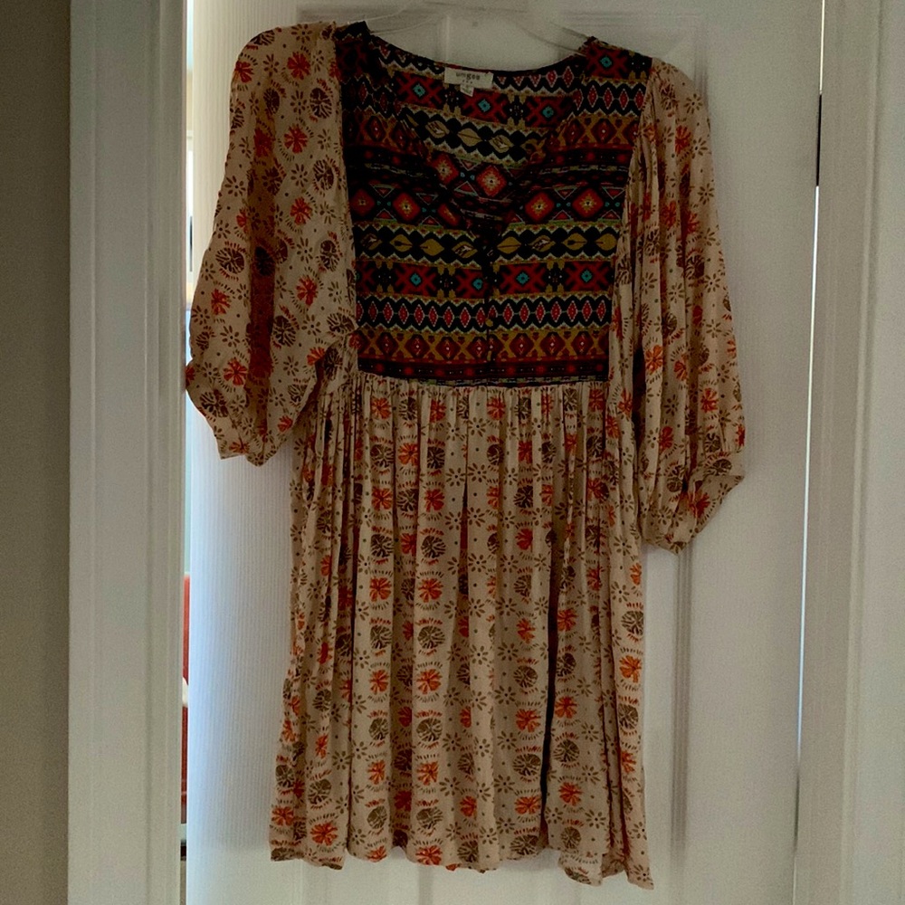 Womens country style dress made up of two patterns.